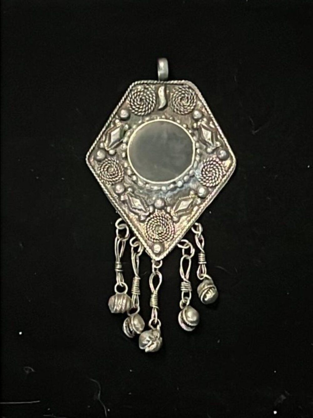 Ornate Shield with Round Black Stone and Bells Pendant
